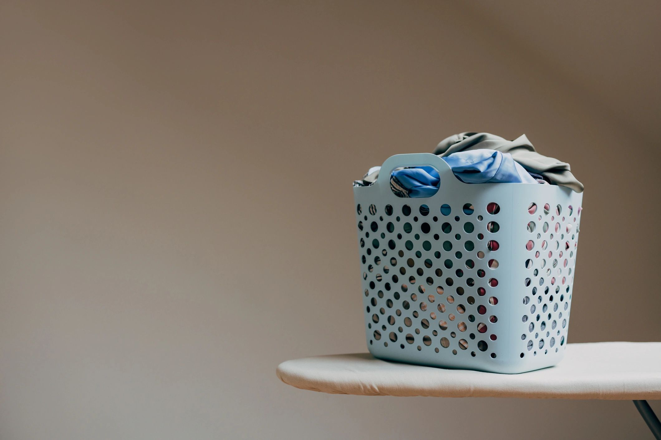 Laundry basket in a bright, minimal home setting